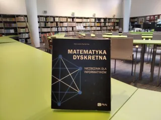 Powiększ obraz: Książka na stole w czytelni